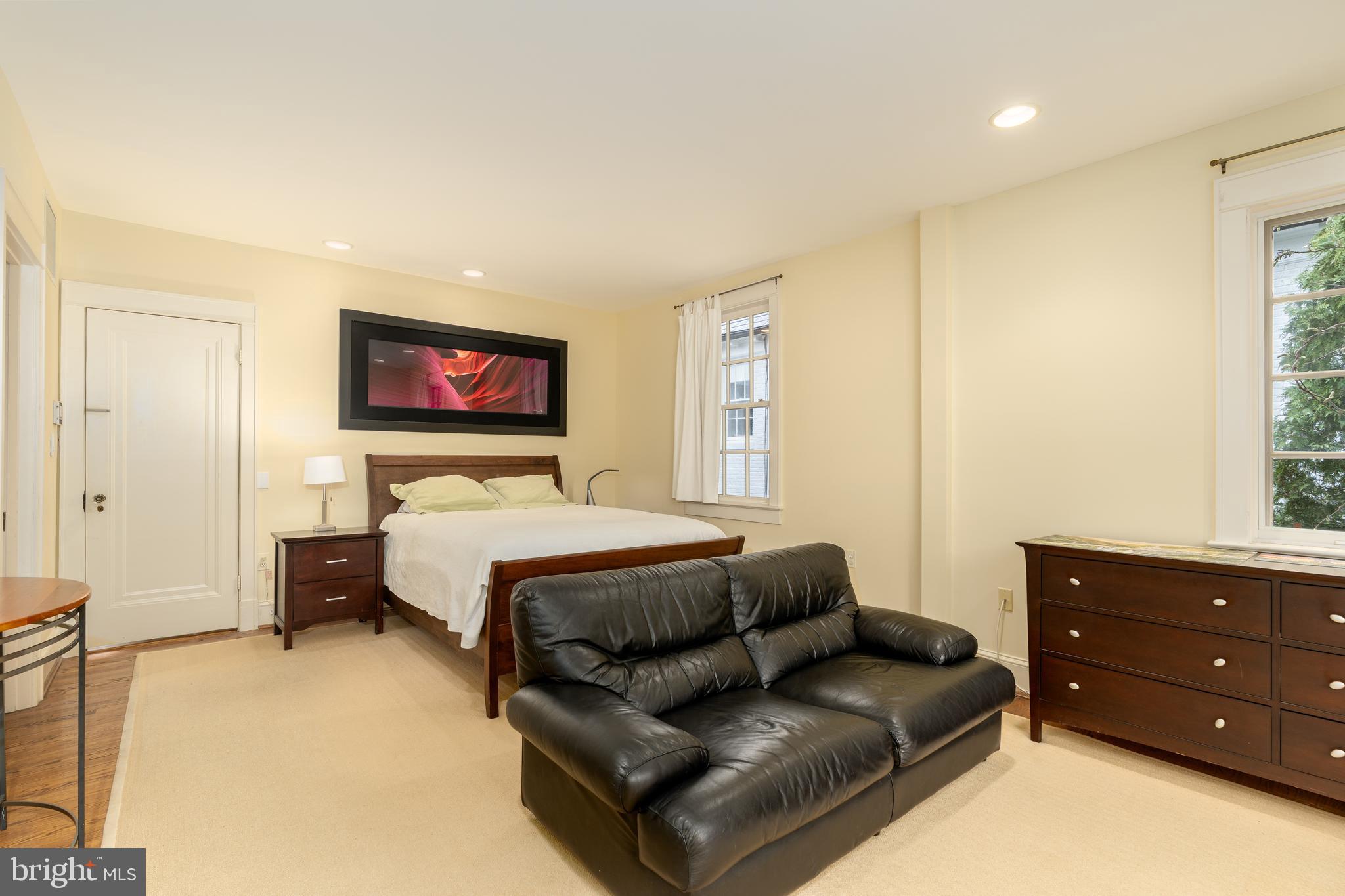 3415 Fulton Street Northwest Washington, DC 20007 - Photo 22 of 68 a bed room with a bed and a dresser