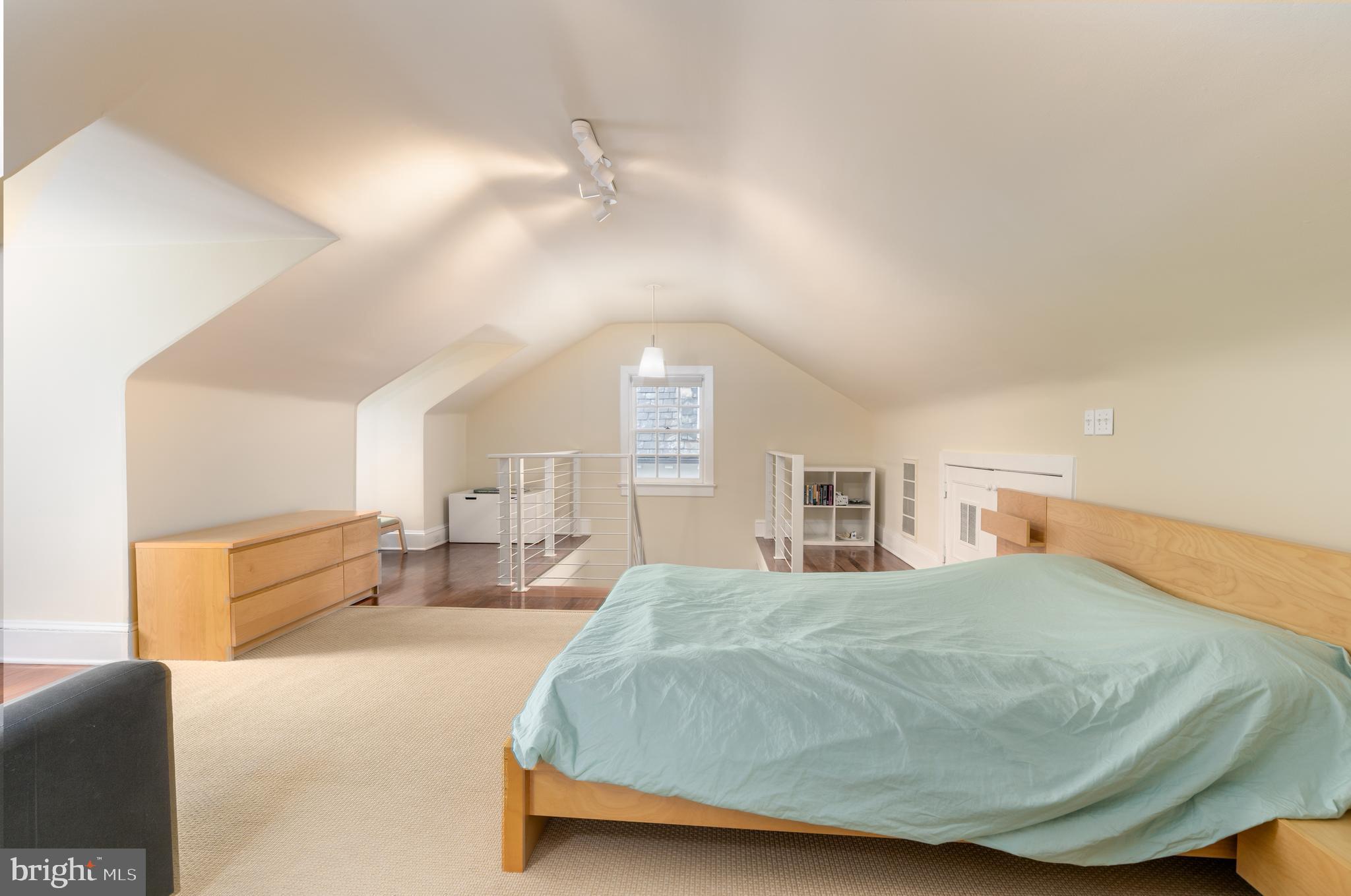 3415 Fulton Street Northwest Washington, DC 20007 - Photo 43 of 68 a bedroom with a bed and window