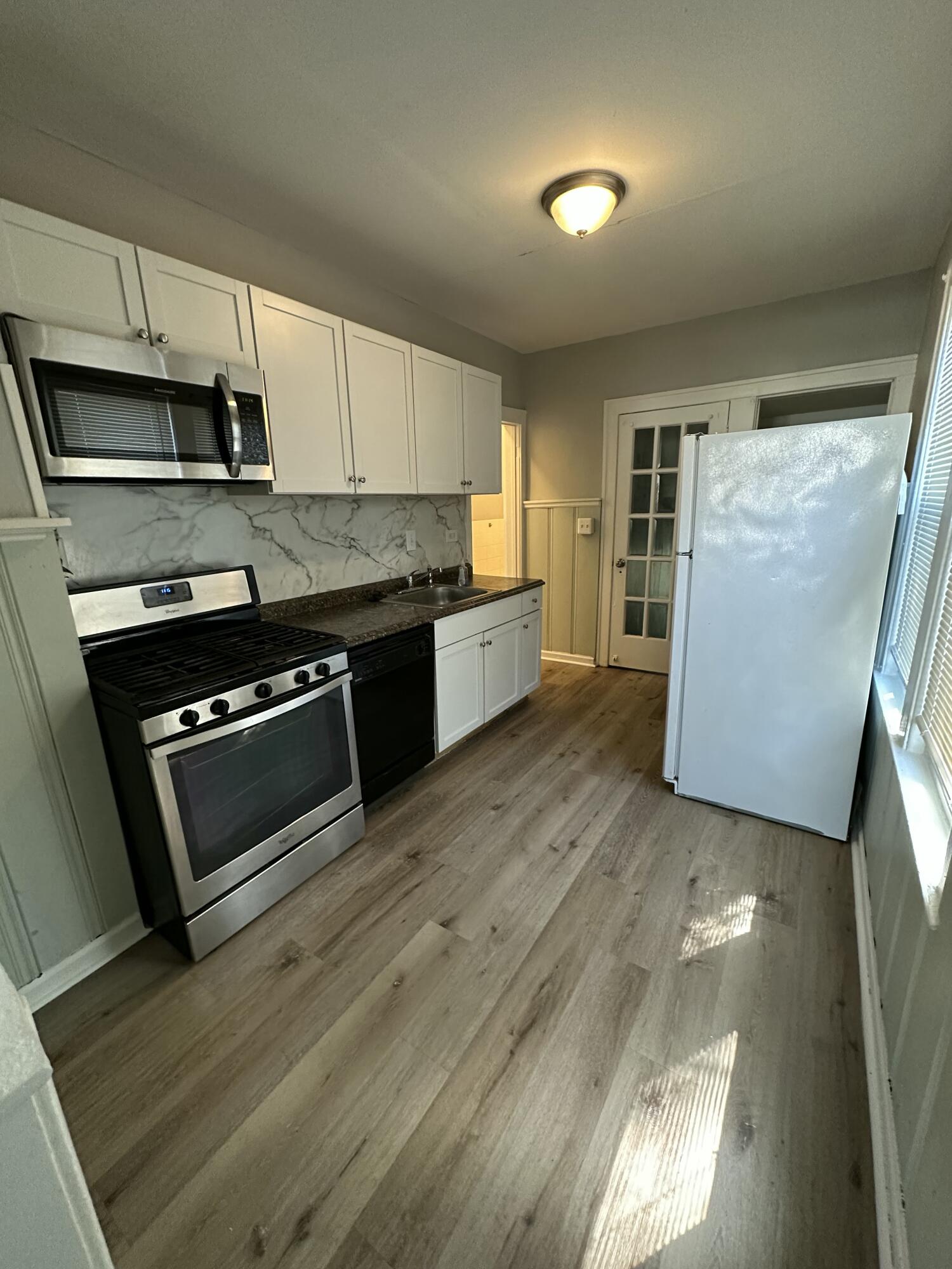 6453 West Point Street Taylor, MI 48180 - Photo 3 of 24 lower unit kitchen