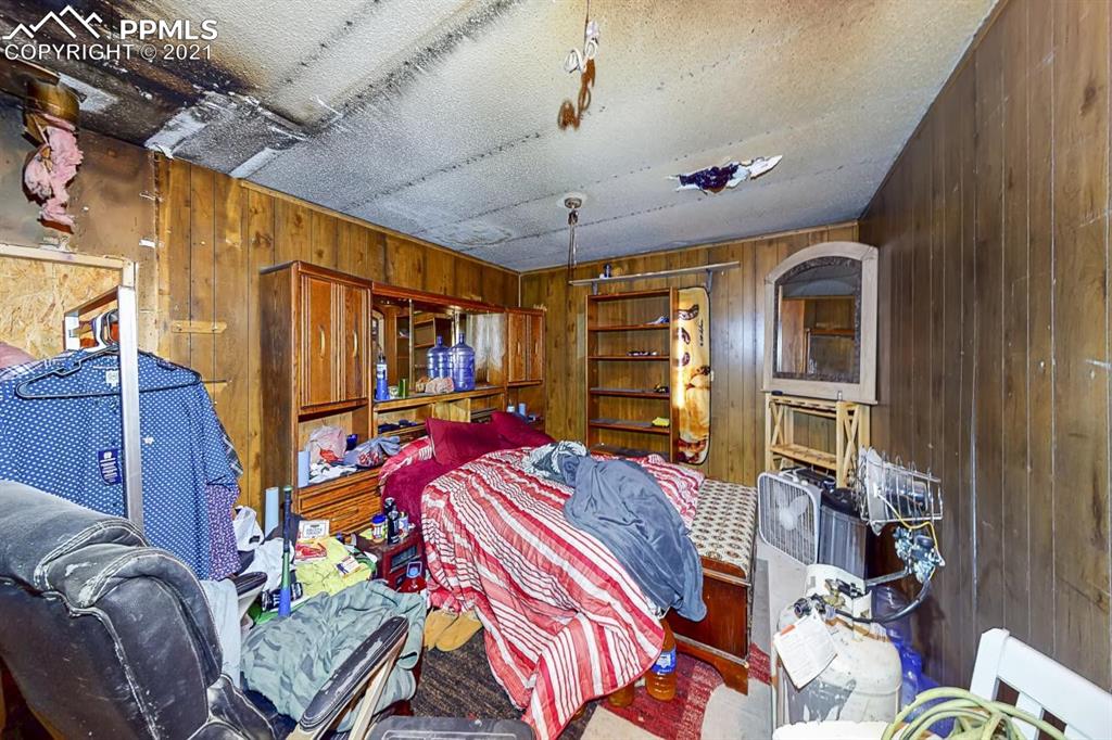511 Buffalo Street Simla, CO 80835 - Photo 13 of 17 a bed in a bedroom next to a window