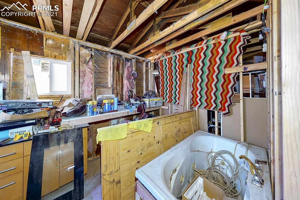 511 Buffalo Street Simla, CO 80835 - Photo 10 of 17 a view of a kitchen with furniture and a window