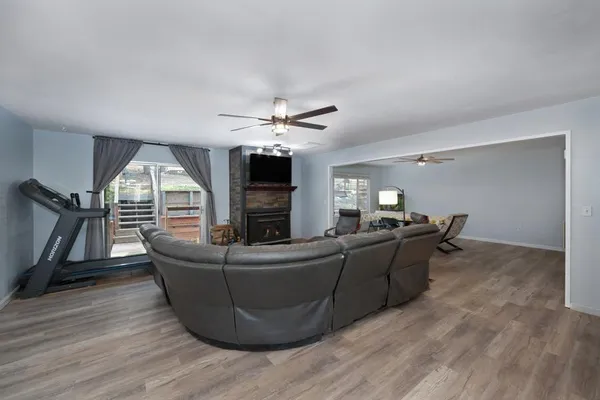 a bed room with a bed and a television