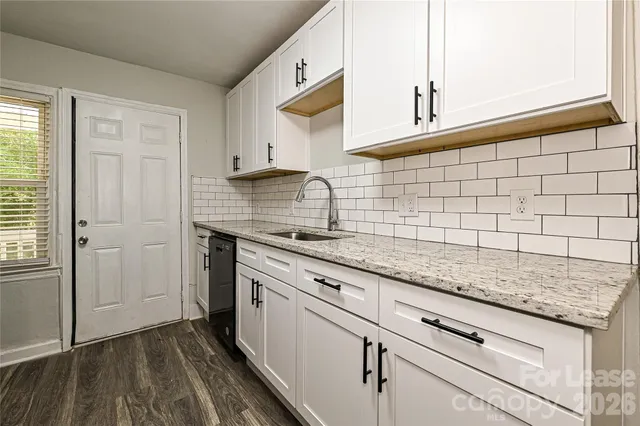 a kitchen with a refrigerator stove and microwave