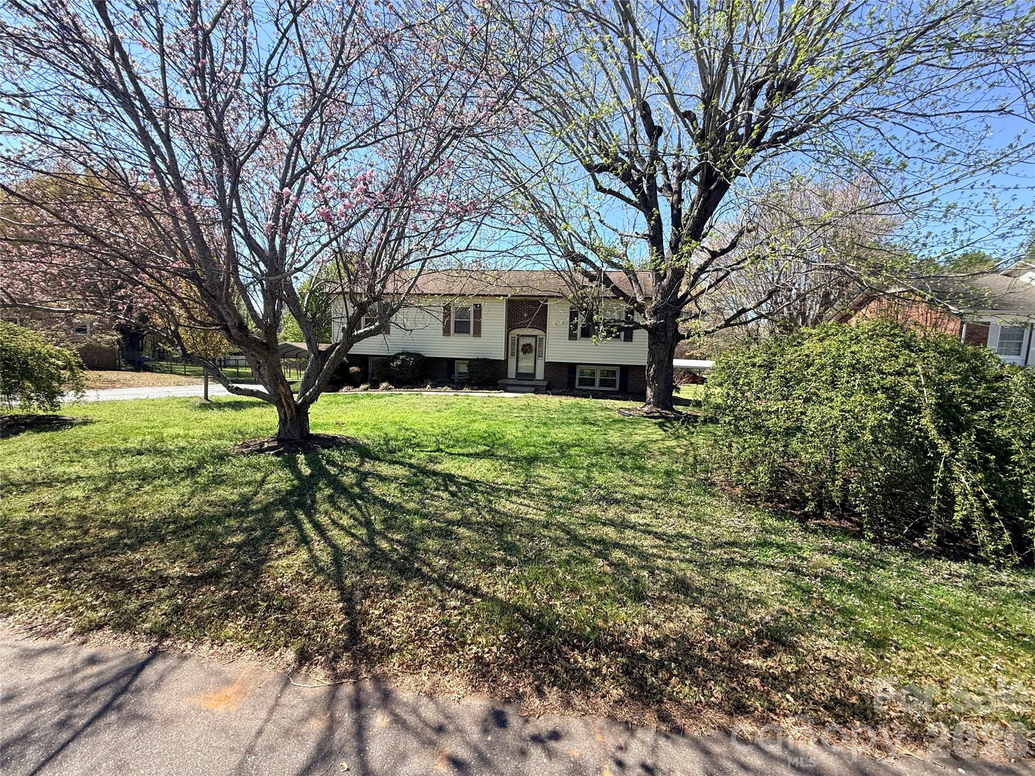 2570 Raintree Street Connelly Springs, NC 28612 - Photo 2 of 39 a view of a house with a yard