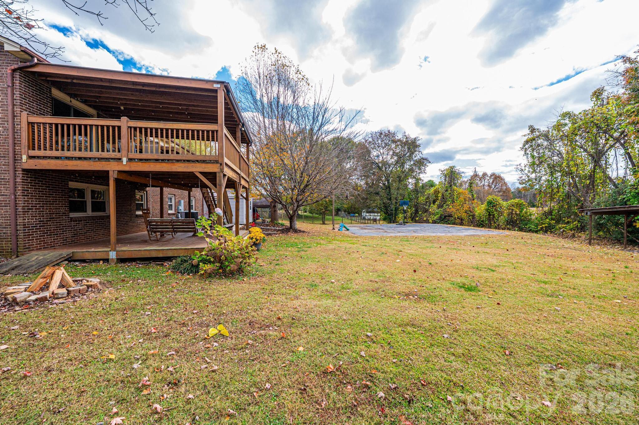 2570 Raintree Street Connelly Springs, NC 28612 - Photo 33 of 39 a view of a house with a yard