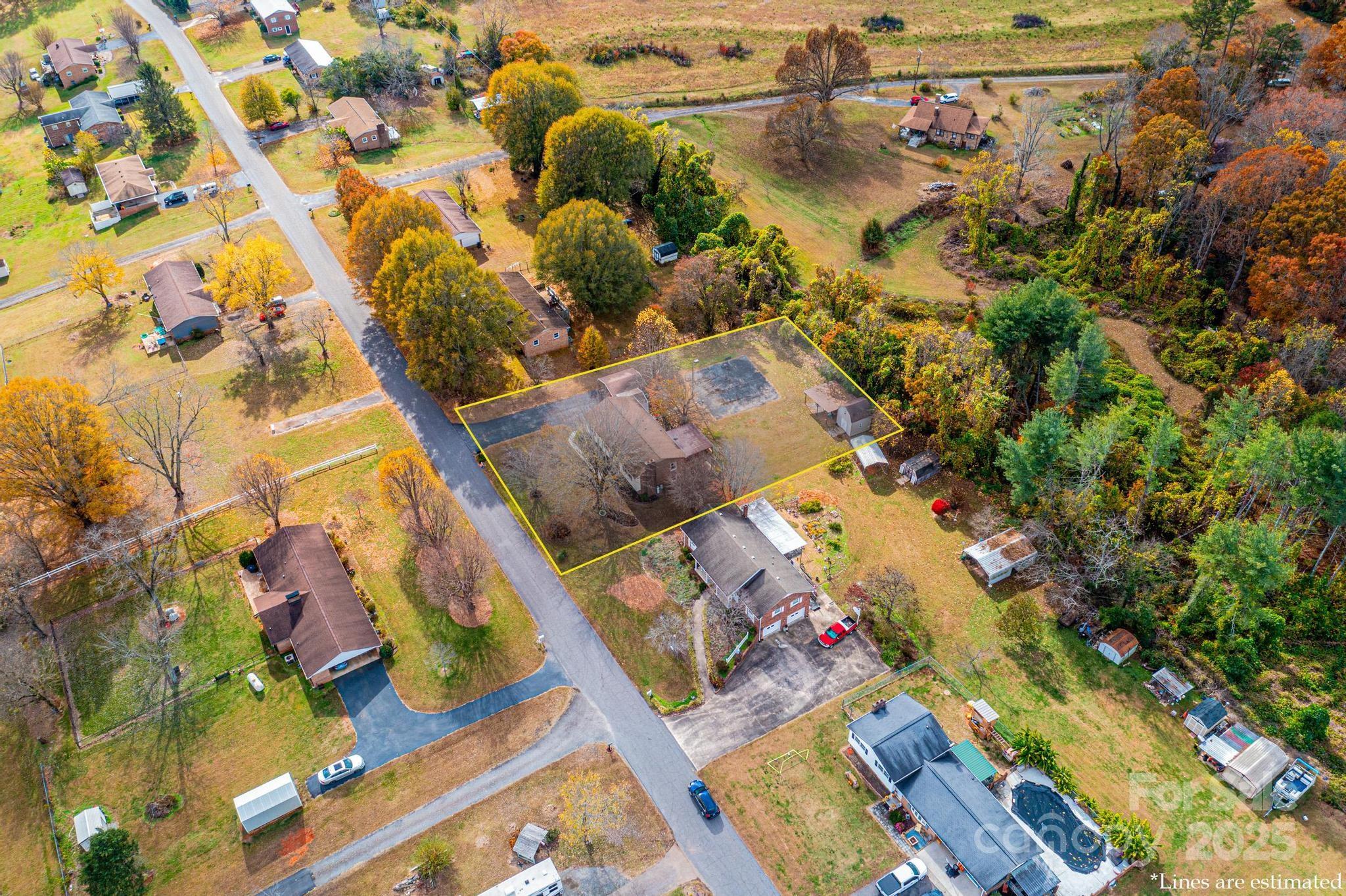 2570 Raintree Street Connelly Springs, NC 28612 - Photo 35 of 37 view of a house with a yard
