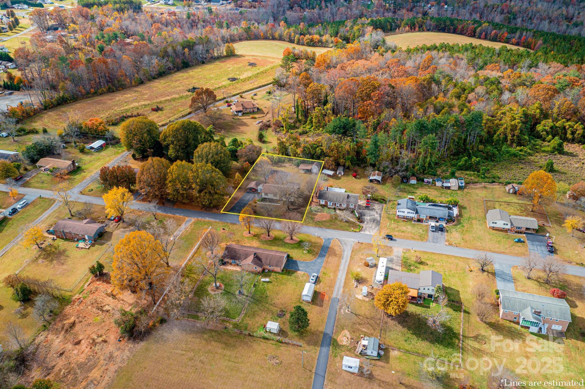 2570 Raintree Street Connelly Springs, NC 28612 - Photo 36 of 37 an aerial view of residential houses with outdoor space