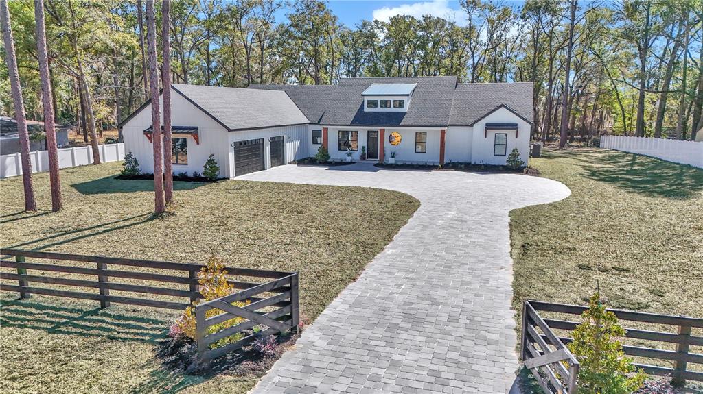 11430 Southwest 61st Place Road Ocala, FL 34481 - Photo 1 of 1 a view of a house with a yard