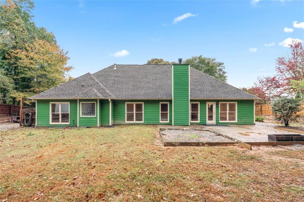 2985 Ashton Pointe Circle Dacula, GA 30019 - Photo 39 of 47 front view of a house with a yard
