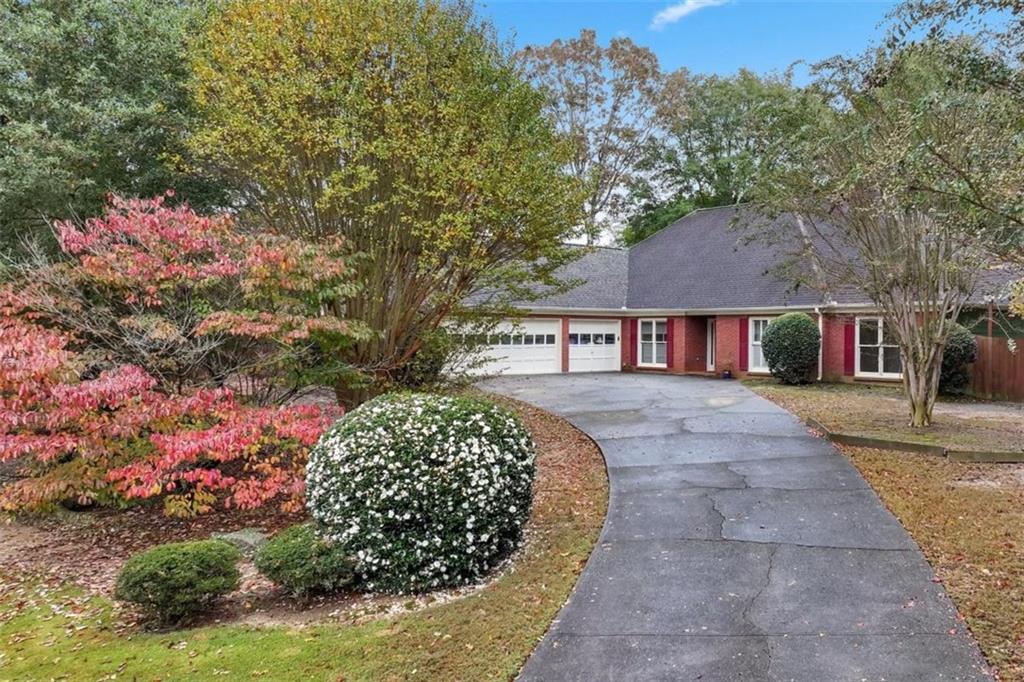 2985 Ashton Pointe Circle Dacula, GA 30019 - Photo 41 of 47 a front view of a house with a garden