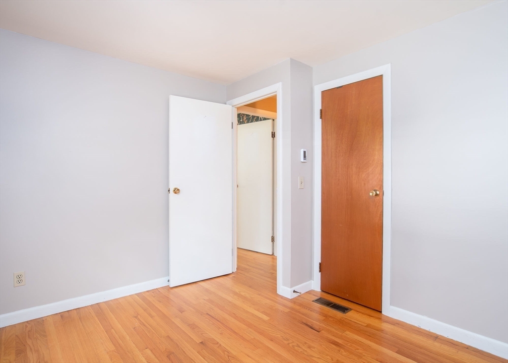 60 Saffron Circle Springfield, MA 01129 - Photo 16 of 37 a view of an empty room with wooden floor
