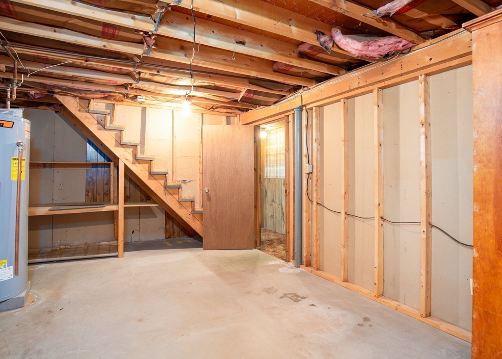 60 Saffron Circle Springfield, MA 01129 - Photo 23 of 37 a view of an empty room with stairs