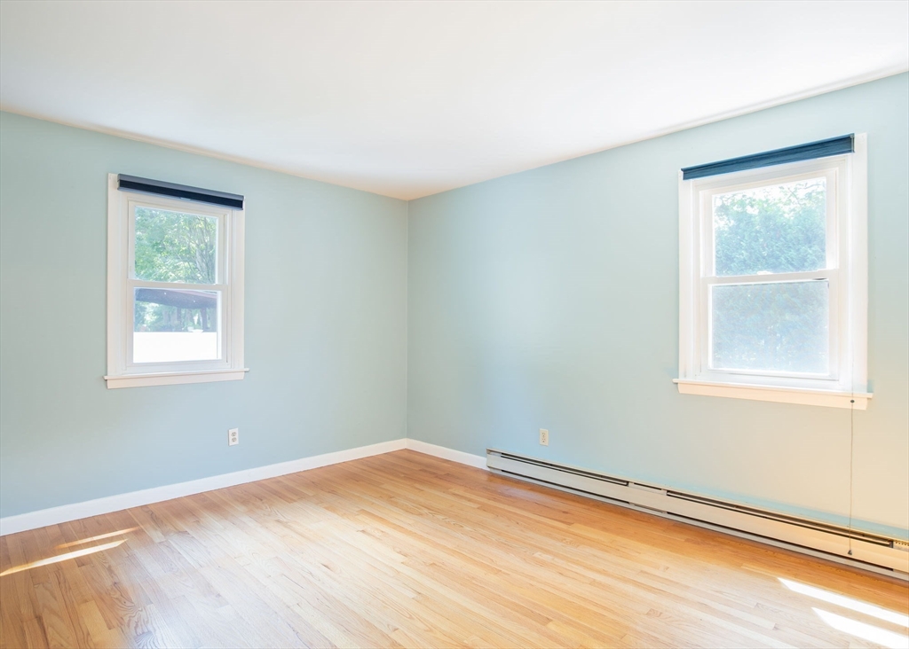 60 Saffron Circle Springfield, MA 01129 - Photo 10 of 37 a view of a room with wooden floor and a window
