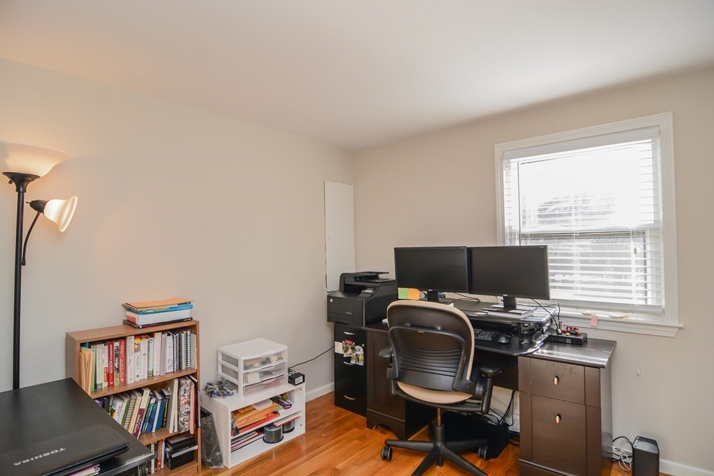 94 West Street Medway, MA 02053 - Photo 19 of 41 a view of a workspace with furniture and a window