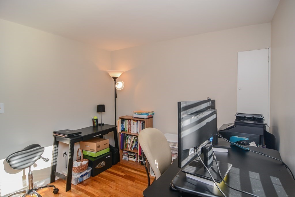 94 West Street Medway, MA 02053 - Photo 20 of 41 a view of a workspace with furniture and a window