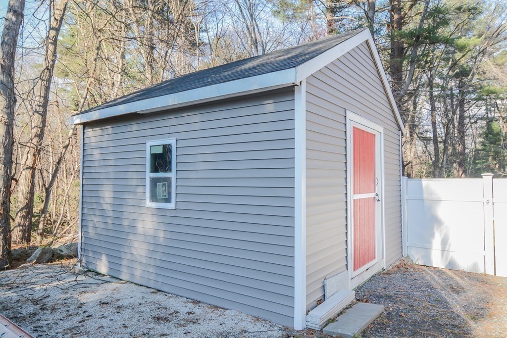 94 West Street Medway, MA 02053 - Photo 29 of 41 a view of a house with a yard