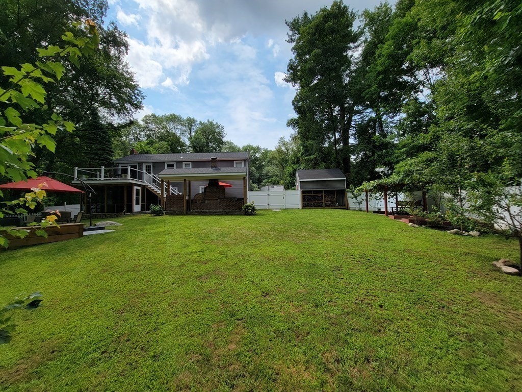94 West Street Medway, MA 02053 - Photo 37 of 41 a view of a house with a backyard