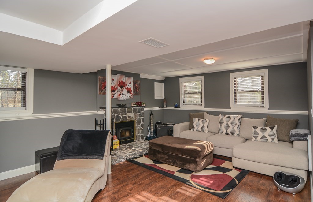 94 West Street Medway, MA 02053 - Photo 40 of 41 a living room with furniture and a rug
