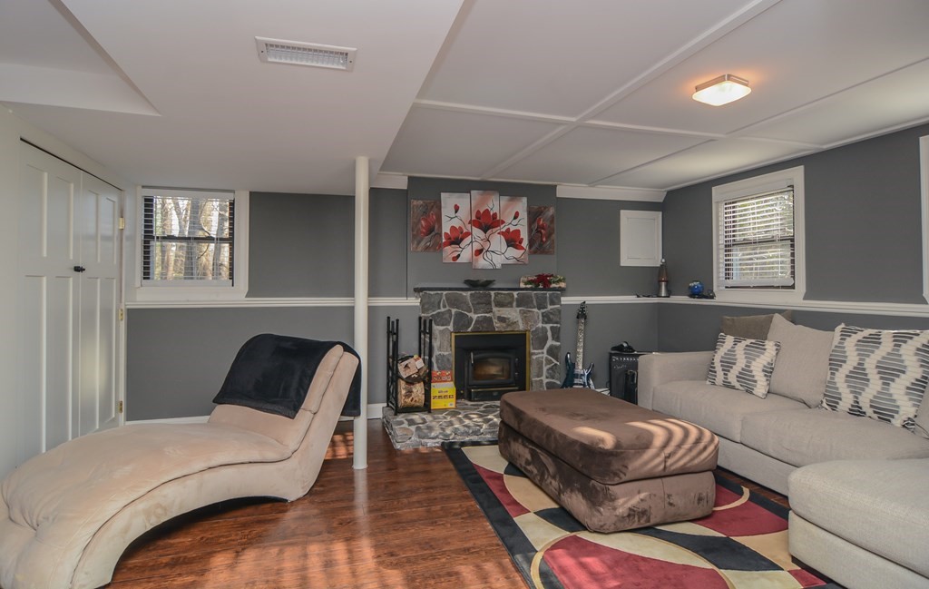 94 West Street Medway, MA 02053 - Photo 41 of 41 a living room with furniture and a fireplace