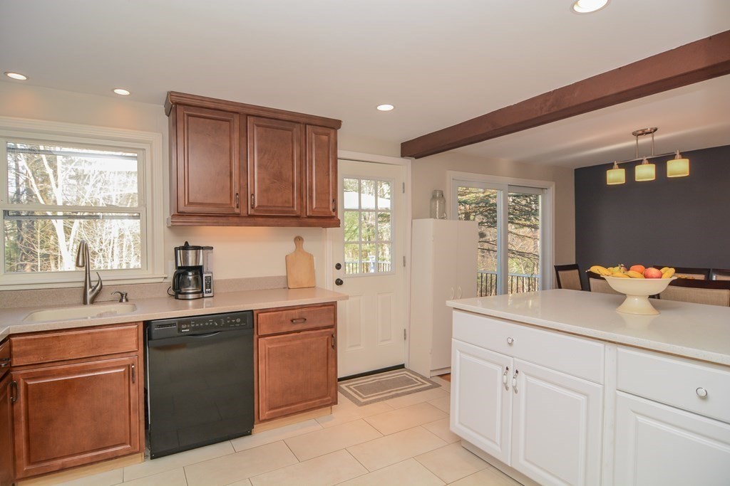 94 West Street Medway, MA 02053 - Photo 8 of 41 a kitchen with a sink dishwasher stove and cabinets