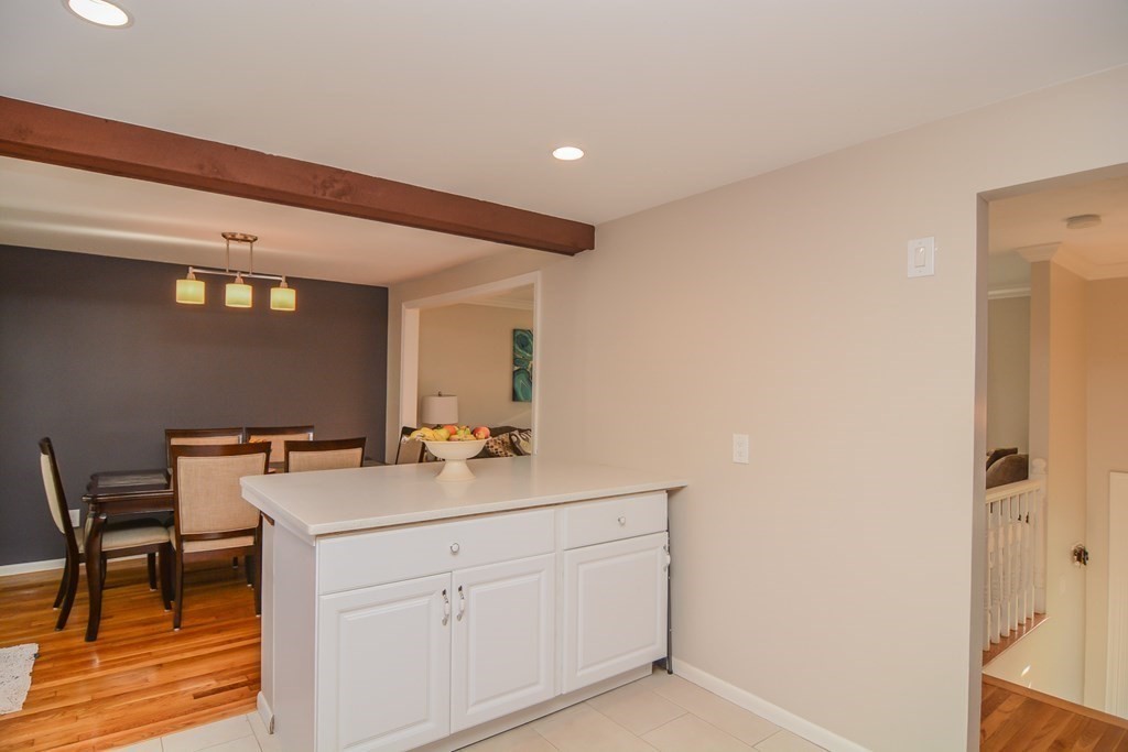 94 West Street Medway, MA 02053 - Photo 9 of 41 a room with a sink cabinets and wooden floor