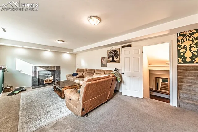 a spacious bedroom with a bed and a large cabinets