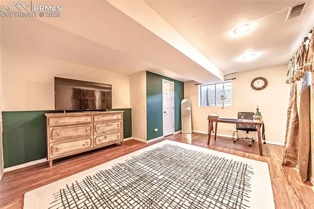 a bedroom with a bed and furniture