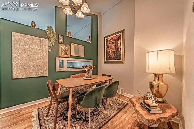 a view of a dining room with furniture