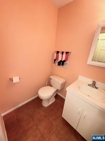 a bathroom with a toilet and a sink