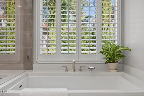 a utility room with sink dryer and washer