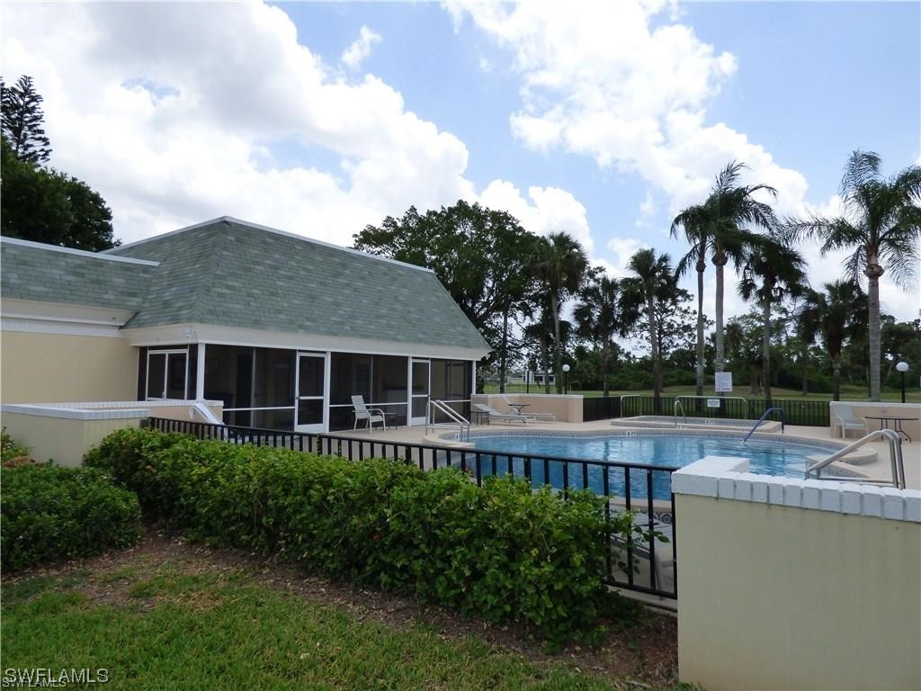 3 Regency Court Lehigh Acres, FL 33936 - Photo 26 of 27 a house view with a garden space