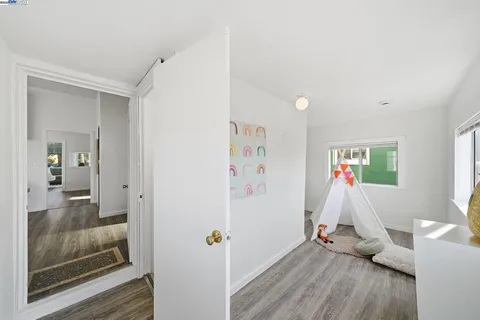 workspace with wooden floor and windows