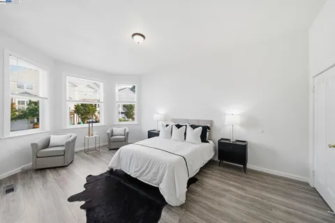 a bed room with bed and a couch