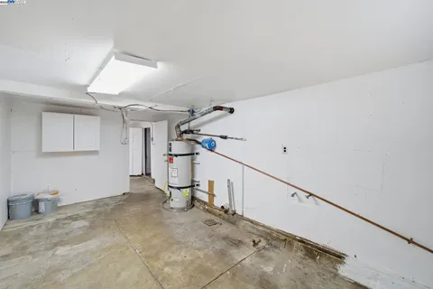 a view of a hallway with staircase