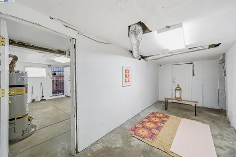 a bedroom with a bed and a table in it