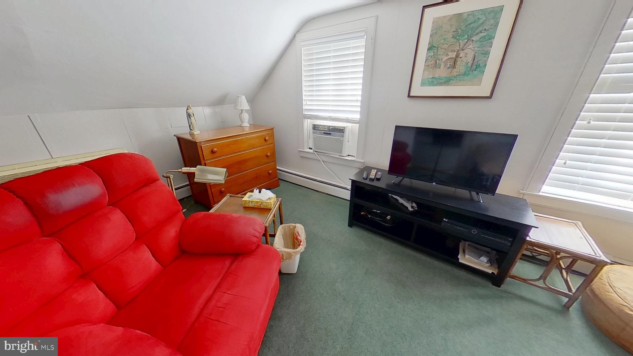 11525 High Point Road, Unit COTTAGE Felton, PA 17322 - Photo 6 of 7 a living room with furniture and a flat screen tv
