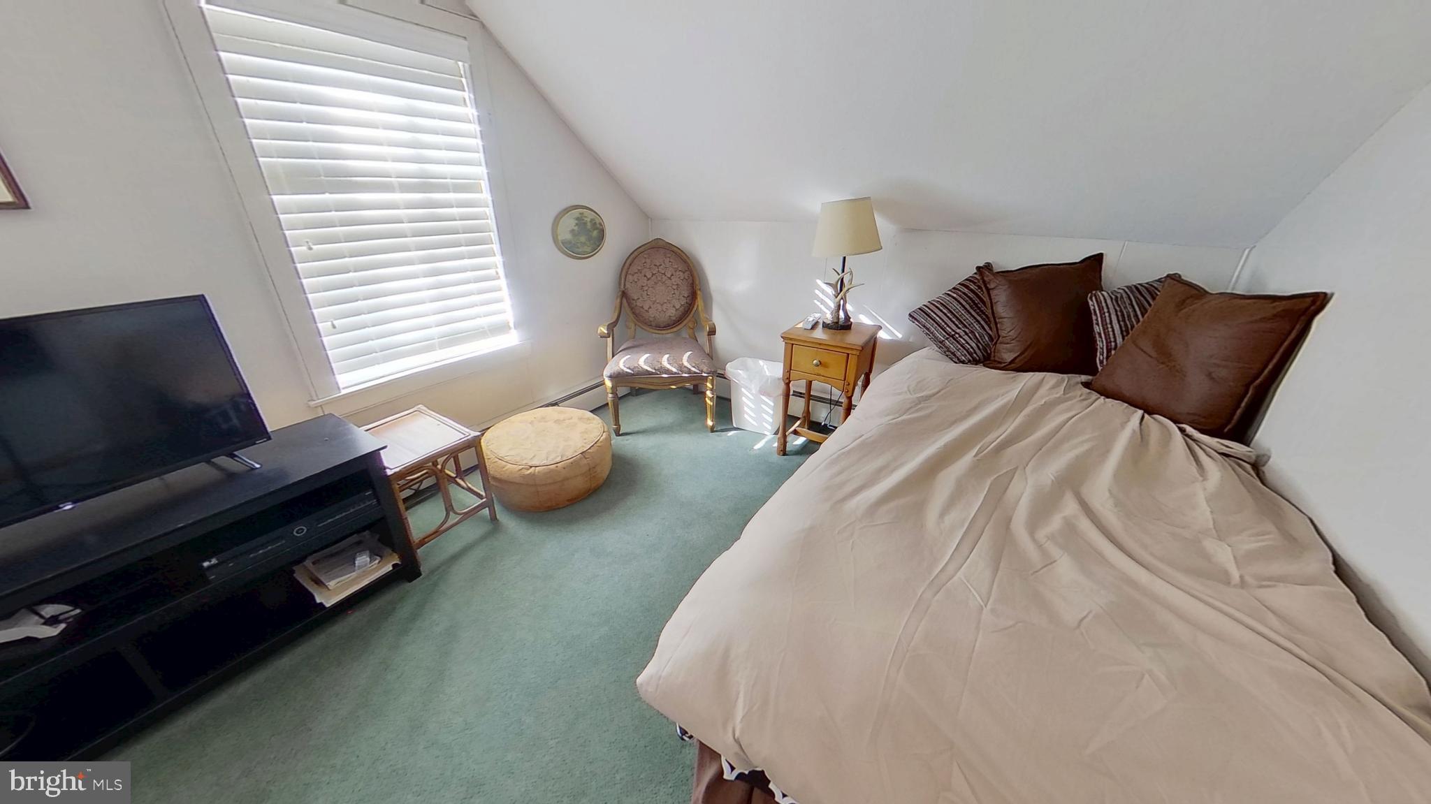 11525 High Point Road, Unit COTTAGE Felton, PA 17322 - Photo 7 of 7 a bedroom with bed and a flat tv screen on dresser