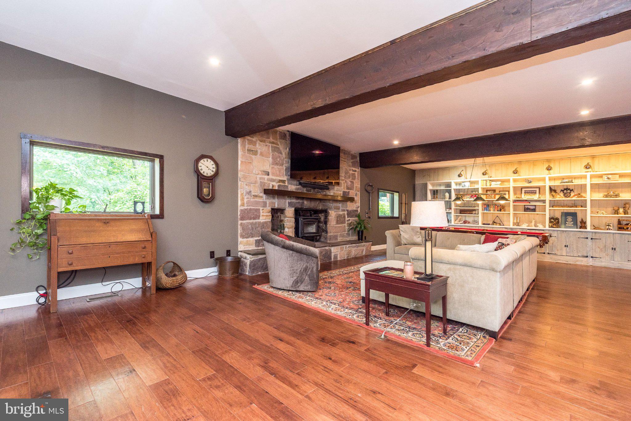 24 Springtree Lane Yardley, PA 19067 - Photo 55 of 84 a living room with furniture and a flat screen tv