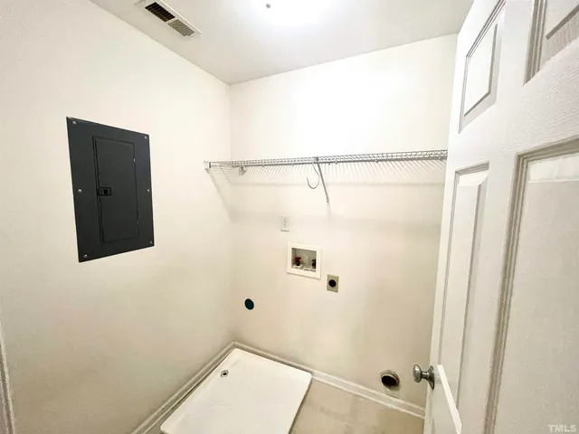 a bathroom with a shower and a toilet