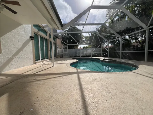 a view of a backyard of the house