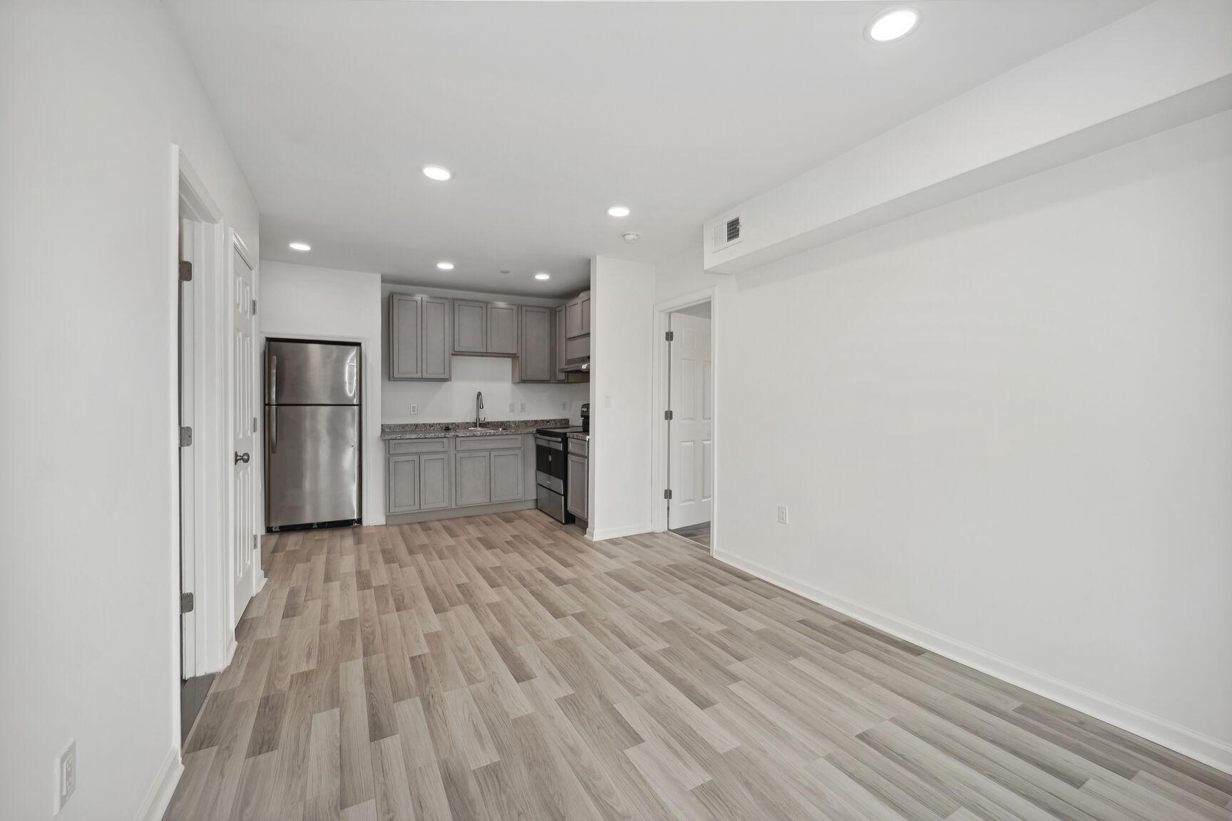 1642 16th Street Southeast, Unit 3 Washington, DC 20020 - Photo 11 of 22 a view of kitchen with wooden floor