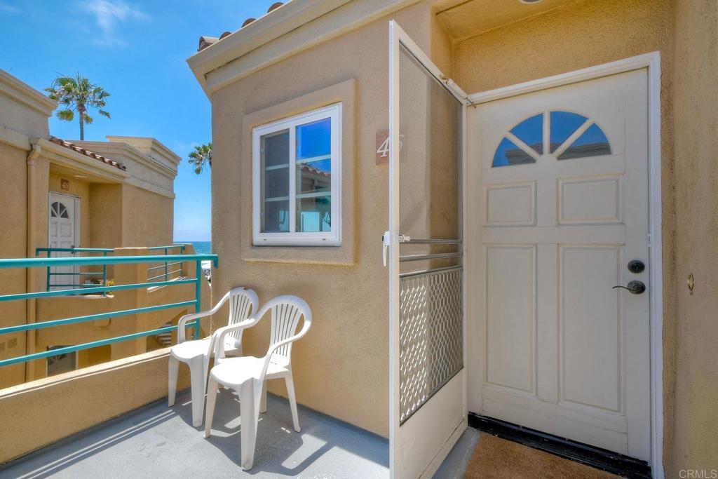 400 The Strand North, Unit 46 Oceanside, CA 92054 - Photo 17 of 25 a dining room with furniture and wooden floor