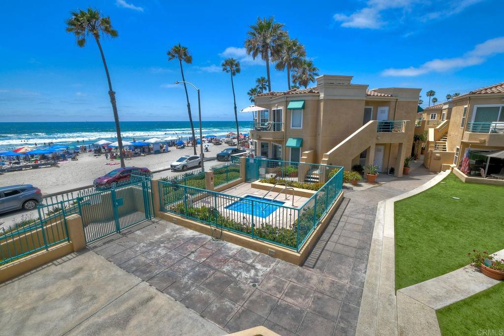 400 The Strand North, Unit 46 Oceanside, CA 92054 - Photo 19 of 25 a view of a park with chairs