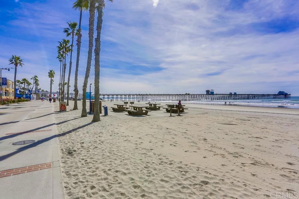 400 The Strand North, Unit 46 Oceanside, CA 92054 - Photo 24 of 25 a view of a lake with beach