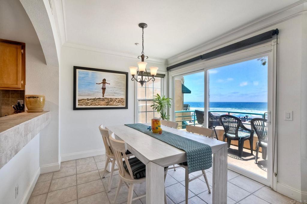 400 The Strand North, Unit 46 Oceanside, CA 92054 - Photo 6 of 25 a view of a dining room with furniture window and outside view