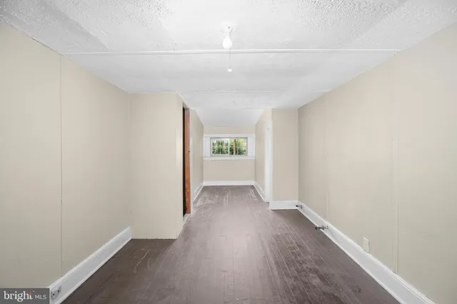 a view of an empty room with window