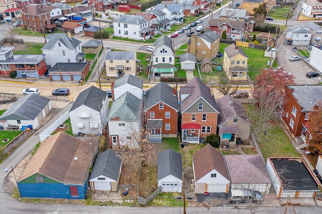 1167 Race Street McKees Rocks, PA 15136 - Photo 2 of 25 an aerial view of residential houses with outdoor space