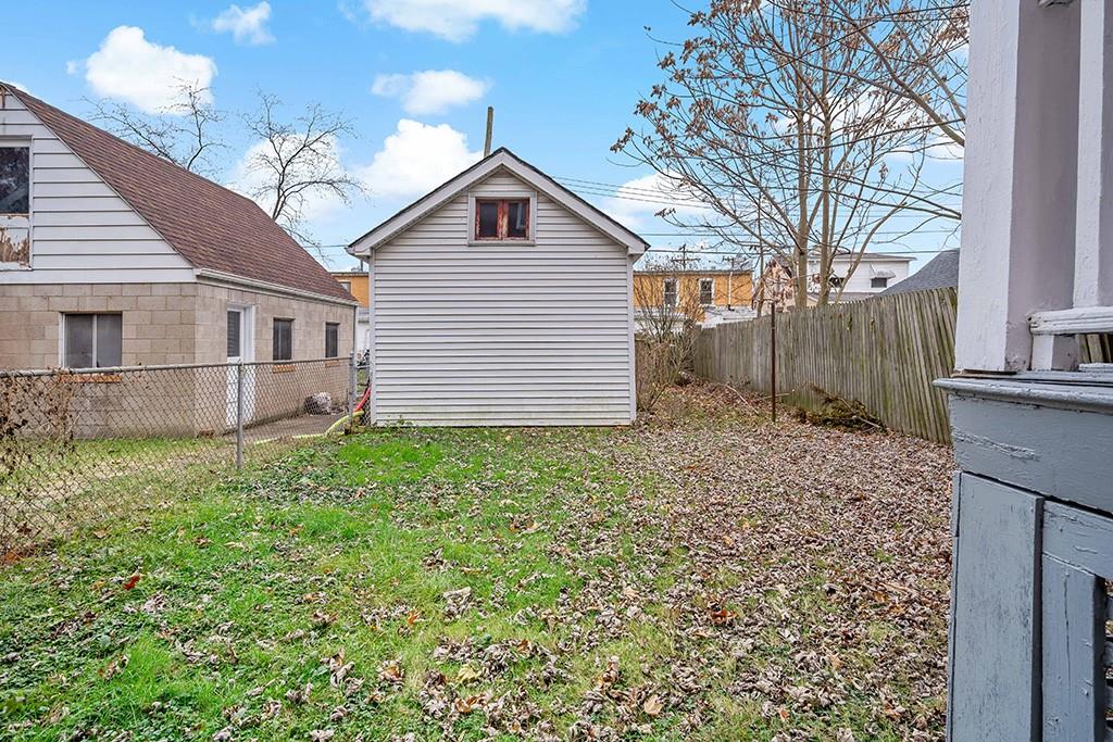 1167 Race Street McKees Rocks, PA 15136 - Photo 13 of 25 a view of a house with a yard
