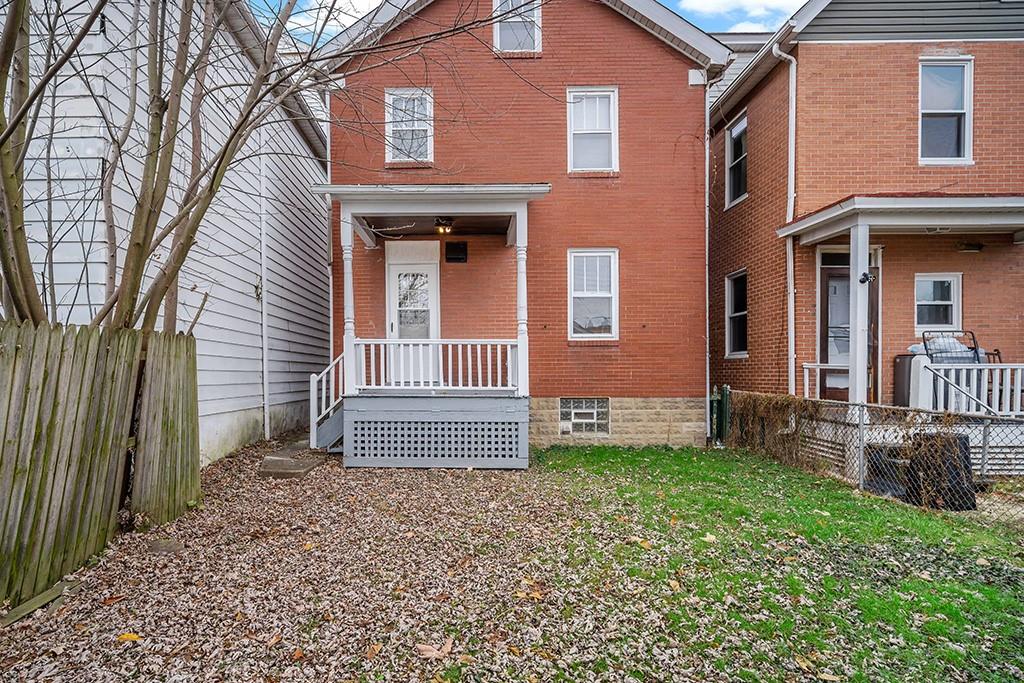 1167 Race Street McKees Rocks, PA 15136 - Photo 25 of 25 front view of a house with a yard