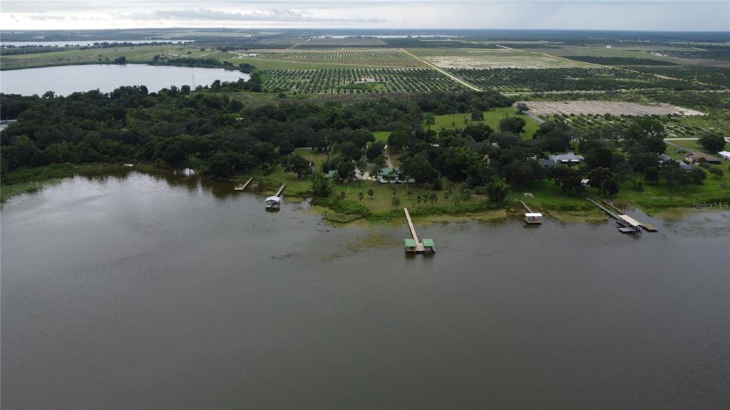 742 North Lake Reedy Boulevard Frostproof, FL 33843 - Photo 2 of 19 a view of a lake with outdoor space